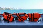 Safety Life Vests Hanging On Ferry Boat Stock Photo