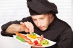 Chef Decorating Delicious Fruit Plate Stock Photo