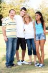 Happy Family Of Four Stock Photo