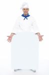 Chef Holding Blank Billboard Stock Photo