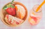 Infused Water Bottle Of Mix Fruit Refreshing Drink Stock Photo