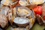 Fresh Clams On An Iron Skillet Stock Photo