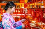 Women In Traditional Japanese Kimonos At Fushimi Inari Shrine In Kyoto, Japan Stock Photo