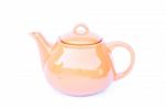 Orange Ceramic Teapot Isolated On White Background Stock Photo