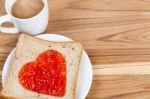 Delicious Slice Of Bread With Strawberry Jam Heart Shape Stock Photo