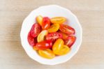 Cherry Tomatoes In White Bowl Stock Photo