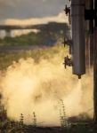 Pressure Pipe With Smoke Flowing From Metal Tube In Oil Refinery Stock Photo