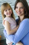 Mother And Daughter Having Fun In The Kitchen Stock Photo