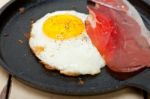 Egg Sunny Side Up With Italian Speck Ham Stock Photo