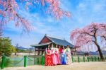 Seoul, South Korea - April 6: Gyeongbokgung Palace With Cherry Blossom In Spring And Tourists With Hanbok Dress On April 6, 2016 In Seoul, South Korea Stock Photo