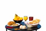 Table With Food As Breakfast On White Background Stock Photo