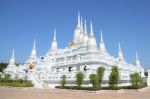 White Pagoda Of Top Church On Blue Sky Stock Photo