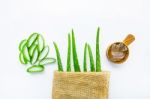 Aloe Vera Fresh Leaves With Aloe Vera Gel On Wooden Measuring Sp Stock Photo