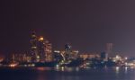 Building Skyline At Night Lights Stock Photo