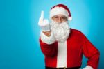 Agitated Santa Showing His Middle Finger Stock Photo