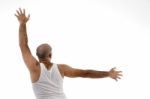 Back Pose Of Male Doing Exercise Stock Photo