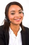 Businesswoman With Headset Stock Photo