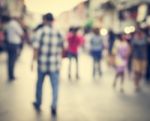 Blurred People Walking On The Street Of Old Town Stock Photo