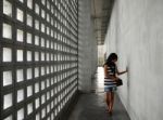 Woman With A Very Sad Expression In Dramatic Interior Stock Photo