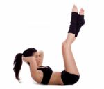 Woman Doing Situp Exercise Stock Photo