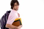 Student Holding Books And Bag Stock Photo