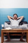 Men Wearing Casual Dress Sleepy In Living Room Stock Photo