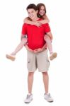 Loving Brother Gives Piggyback To His Beautiful Sister Stock Photo