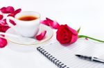  Cup Of Coffee With Red Roses Stock Photo