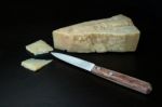 Italian Parmesan Cheese With Knife Stock Photo