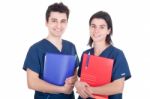 Doctors Team Holding Folders Stock Photo