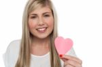 Pretty Girl Holding Cute Pink Paper Heart Stock Photo