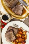 Roast Beef Joint With Roast Vegetables Stock Photo