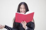 Portrait Of Thai Teen Beautiful Girl Reading Book Stock Photo