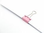 Pink Paperclip Attached On White Paper Isolated Stock Photo