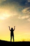 Woman Holding Hands Up Stock Photo