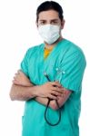 Young Doctor Posing Wearing Face Mask Stock Photo