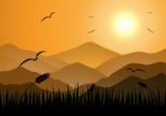 Evening Mountains And Sunset With Birds Fly Stock Photo