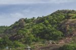 People Walking Up A Hill Stock Photo