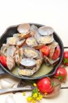 Fresh Clams On An Iron Skillet Stock Photo