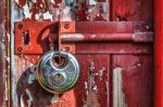 Shiny New Padlock On An Old Door Stock Photo