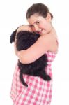 Girl Holding Dog Stock Photo