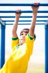 Smart Kid Playing On Jungle Gym Stock Photo