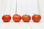 Red Tomatoes Fruits Isolated On White Stock Photo