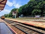 The Train Was Parked At Train Station With Railway Stock Photo