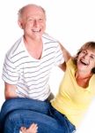 Senior Man Lifting His Wife Stock Photo