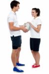 Full Length Portrait Of Sporty Guy And Girl Stock Photo