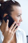 Woman Talking On The Mobile Phone Stock Photo