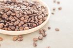 Roast Coffee Bean On Wooden Plate Stock Photo