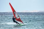 Windsurfing At Porto Pollo In Sardinia Stock Photo