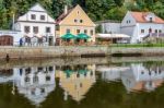 Colourful Buildings Along The Vlatava River In Krumlov Stock Photo